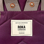 Roka London Finchley keskikokoinen reppu Cherry Lacquer violetti logo